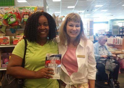 Kelly K. Lavender poses with a reader at her Beautiful Evil Winter booksigning at Barnes & Noble